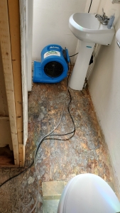 The flooring needed to be removed to repair damage from bathroom flooding